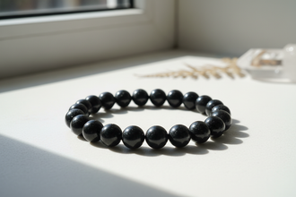 bracelet of black tourmaline photo round bead authentic and orignal, photo should look like clicked by a person or shoot done, not ai generated'